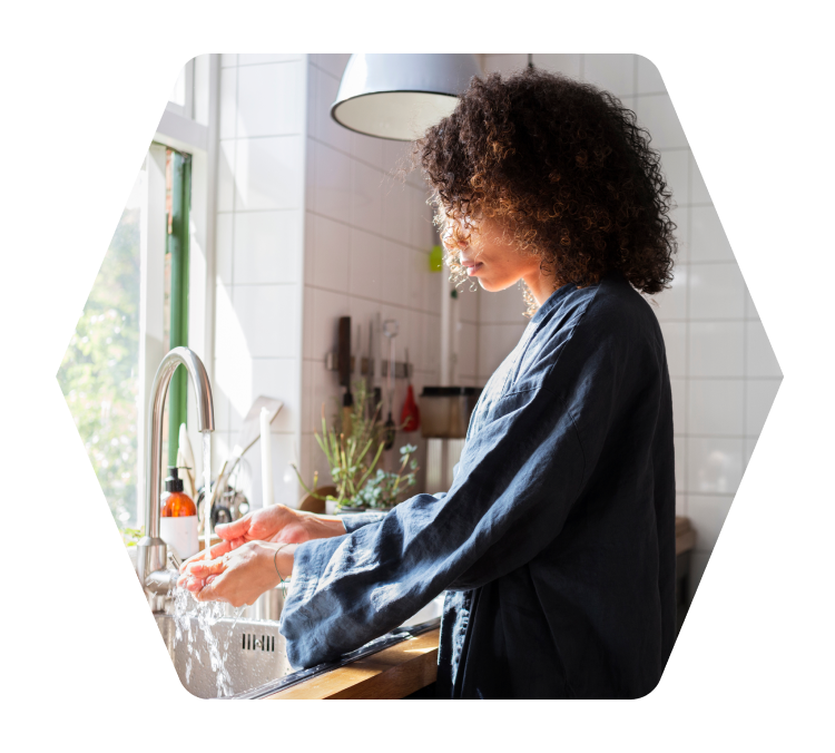 Woman washing her hands